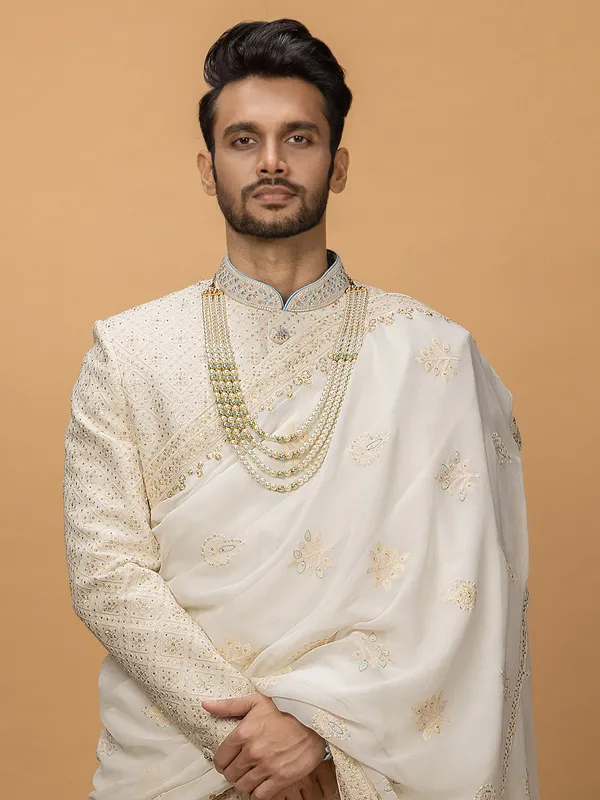 Rich cream silk sherwani for groom