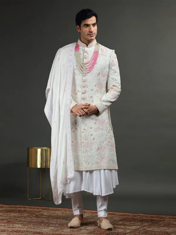 Rich white silk groom sherwani