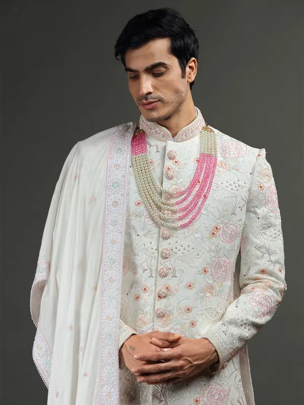 Rich white silk groom sherwani