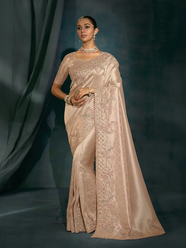 Rose gold silk festive wear saree with mirror worm