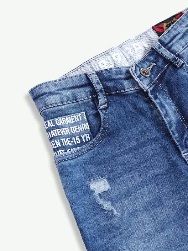 Ruff blue washed and ripped jeans