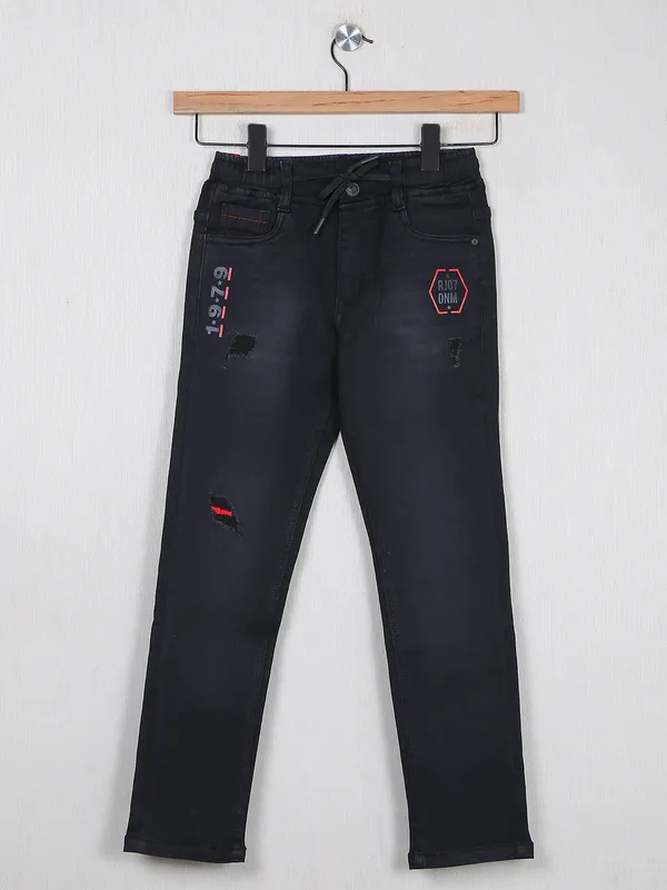 Ruff ripped and washed black denim jeans