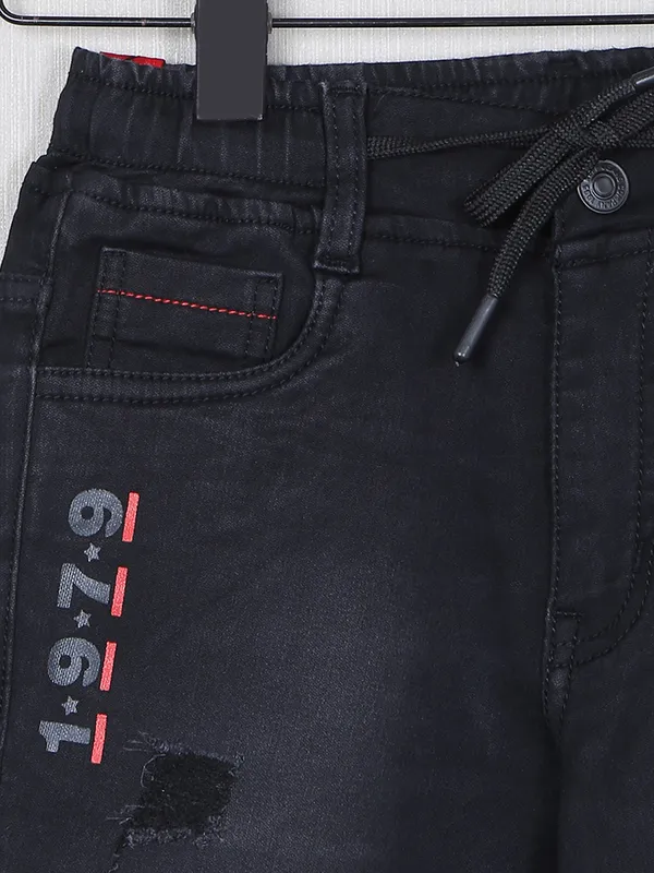 Ruff ripped and washed black denim jeans