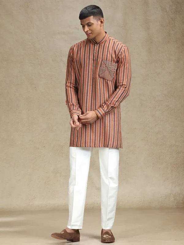 Rust orange and brown kurta pajama set in stripe pattern