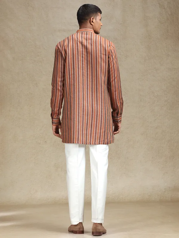 Rust orange and brown kurta pajama set in stripe pattern