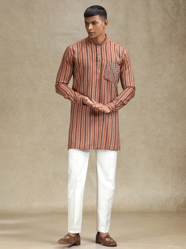 Rust orange and brown kurta pajama set in stripe pattern