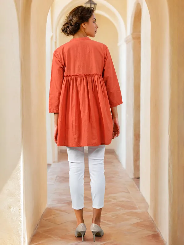 Rust orange cotton thread worked top