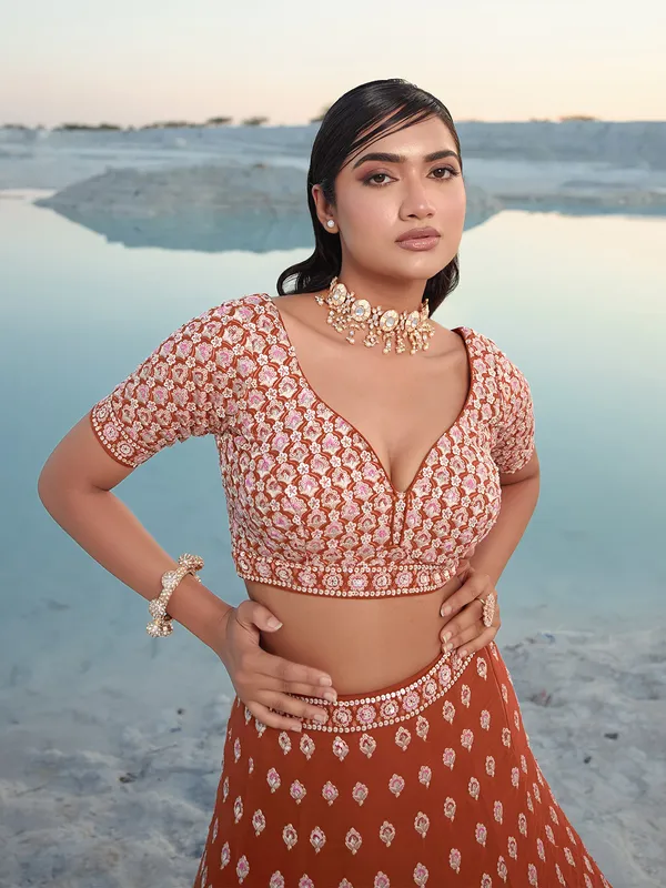Rust orange georgette wedding lehenga choli