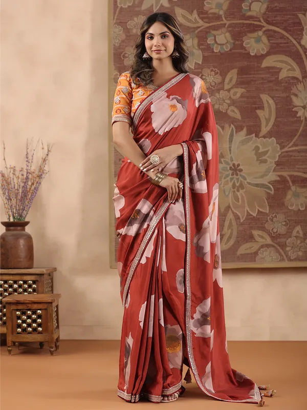 Rust orange muslin printed saree