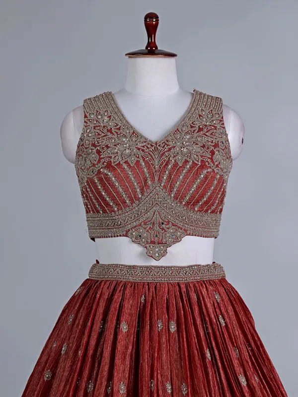 Rust orange silk wedding lehenga choli with stones work