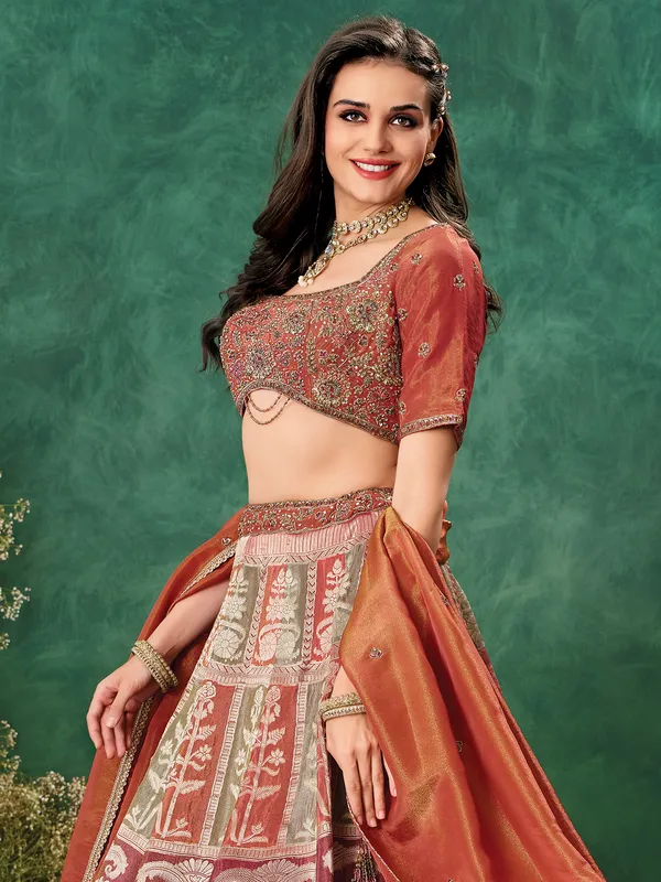 Rust orange tissue silk lehenga choli for wedding wear
