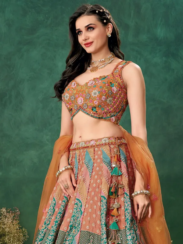 Rust orange wedding wear raw silk lehenga choli