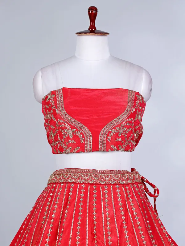 Rust red silk cutdana and resham bridal lehenga choli