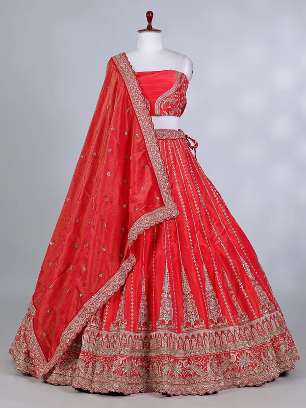Rust red silk cutdana and resham bridal lehenga choli