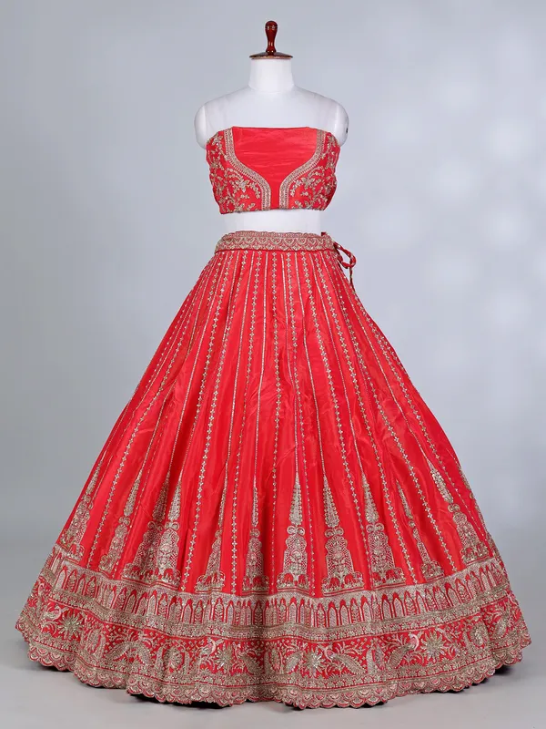 Rust red silk cutdana and resham bridal lehenga choli