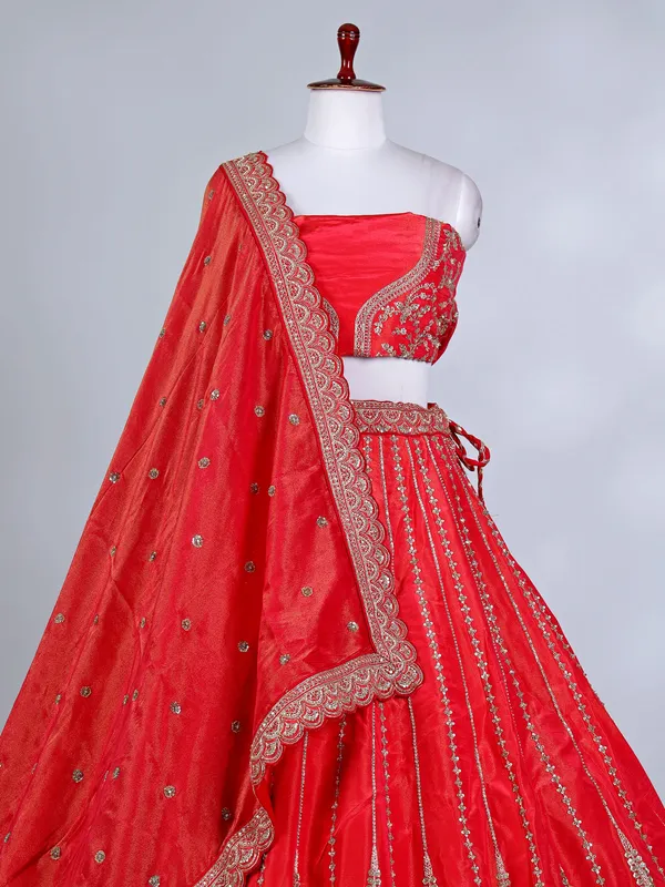 Rust red silk cutdana and resham bridal lehenga choli