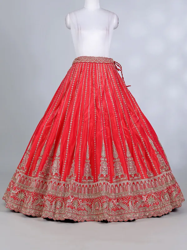 Rust red silk cutdana and resham bridal lehenga choli