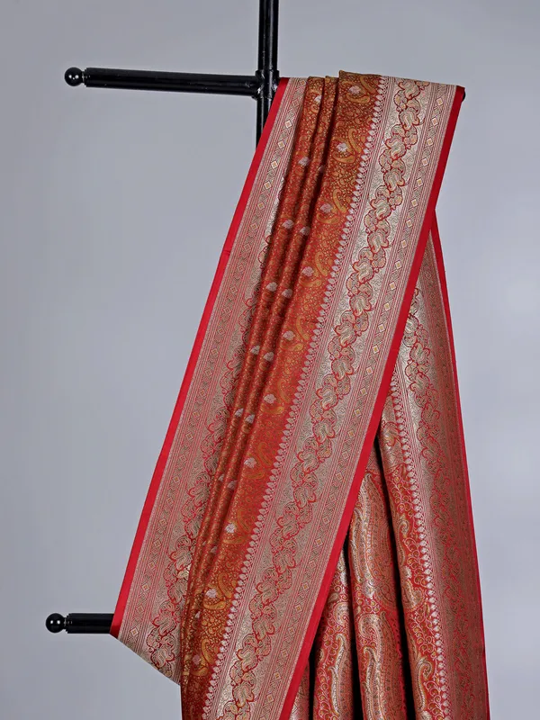 Rustic orange art silk saree embellished with zari work