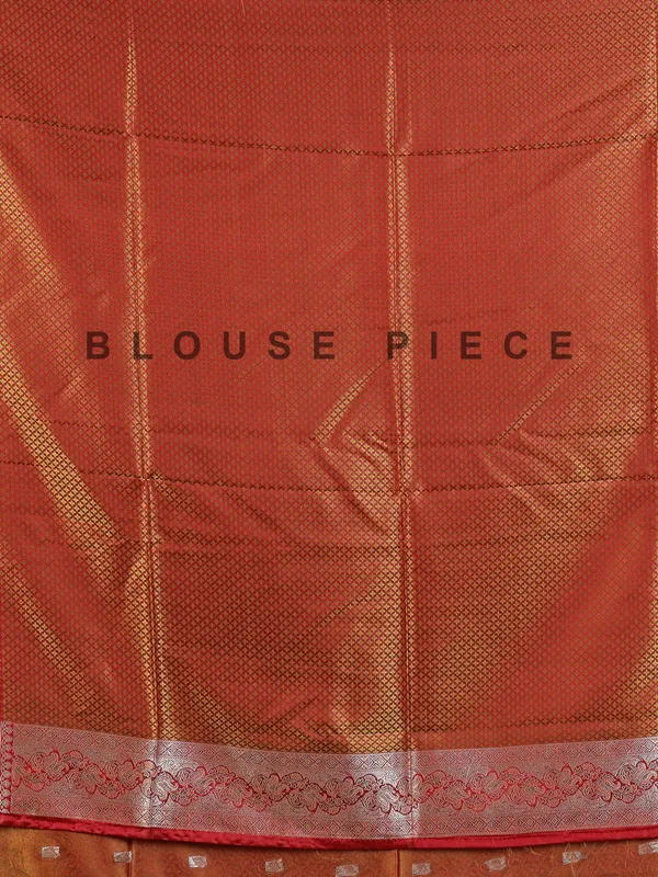 Rustic orange art silk saree embellished with zari work