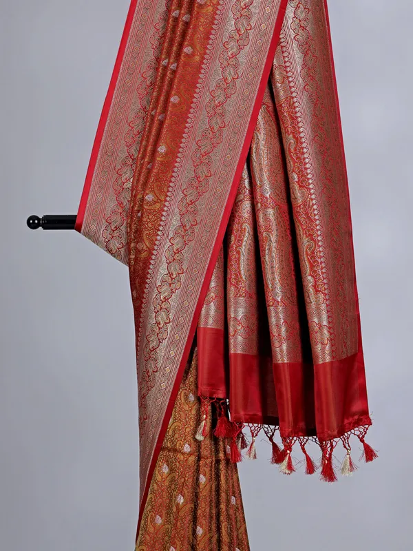 Rustic orange art silk saree embellished with zari work