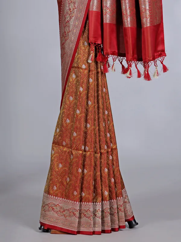 Rustic orange art silk saree embellished with zari work