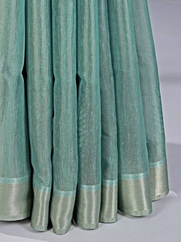 Sage green cotton silk saree with aabla accents