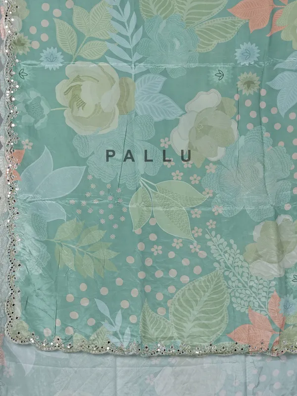 Sage green crepe silk saree with sequins and mirror work