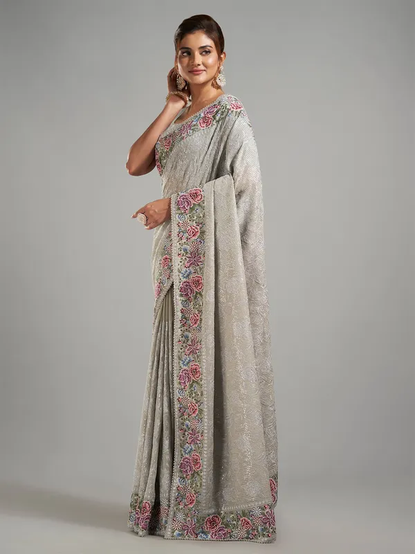 Sage green georgette saree for festive