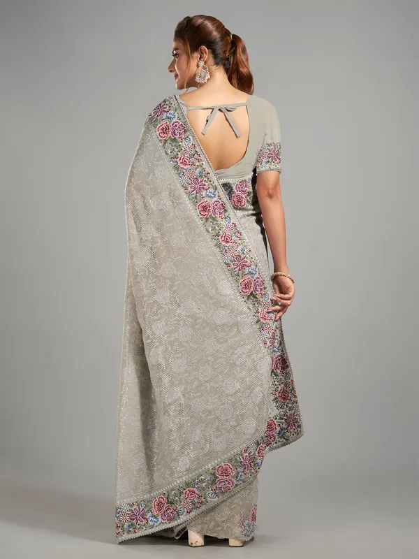 Sage green georgette saree for festive