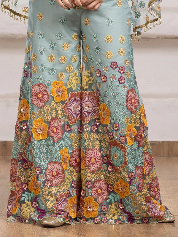 Sage green net palazzo salwar suit with jacket