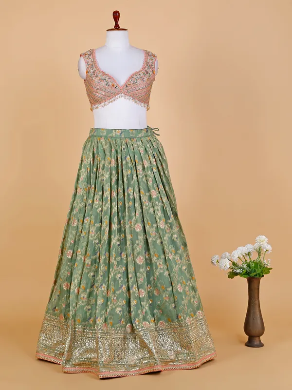 Sage green organza lehenga choli with duatta