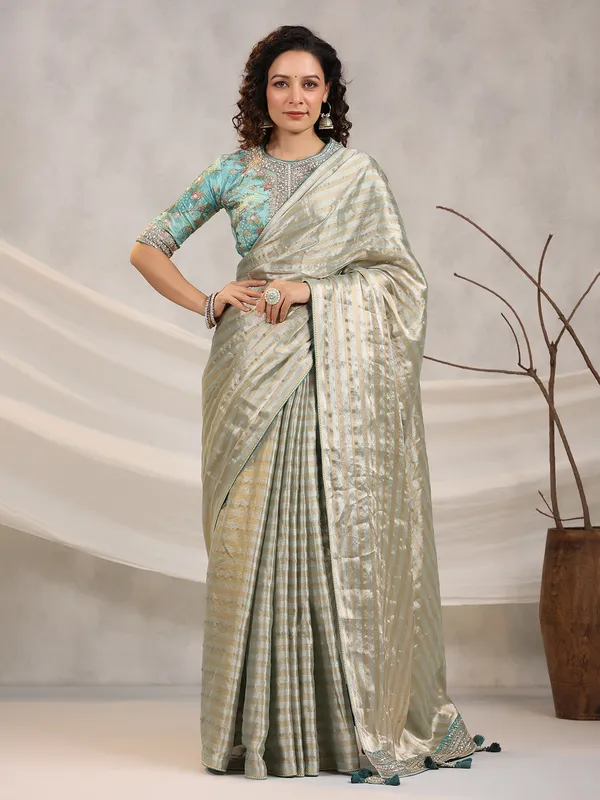 Sage green silk stripe saree