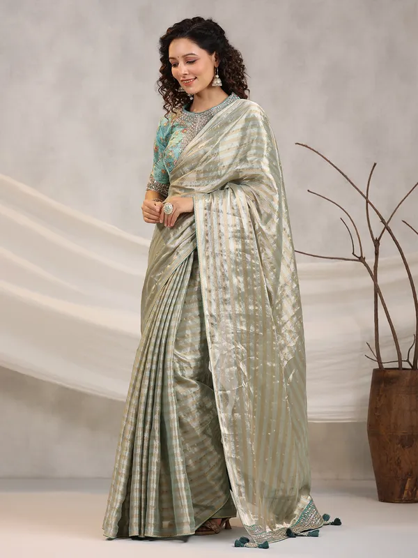 Sage green silk stripe saree