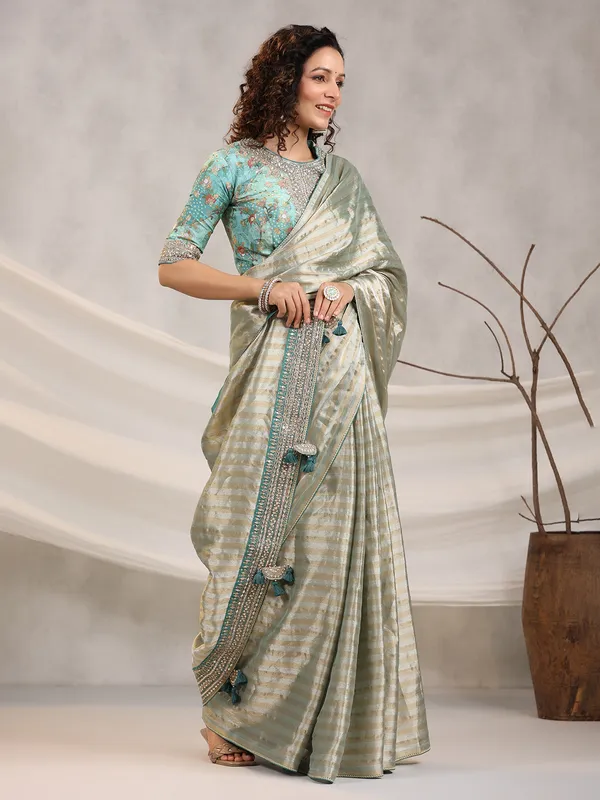 Sage green silk stripe saree
