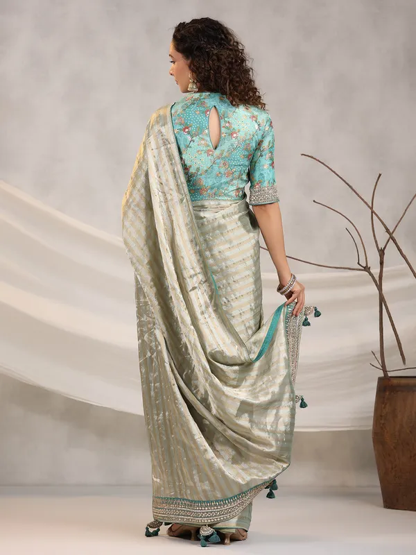 Sage green silk stripe saree