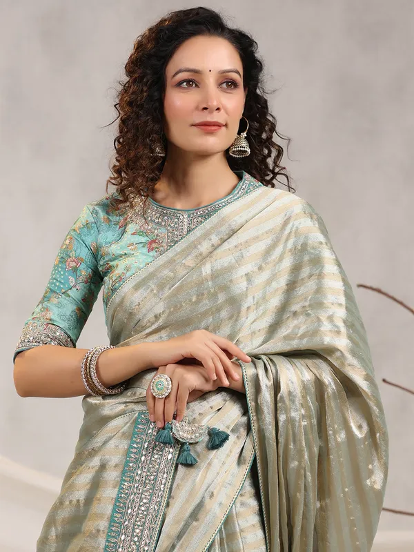Sage green silk stripe saree