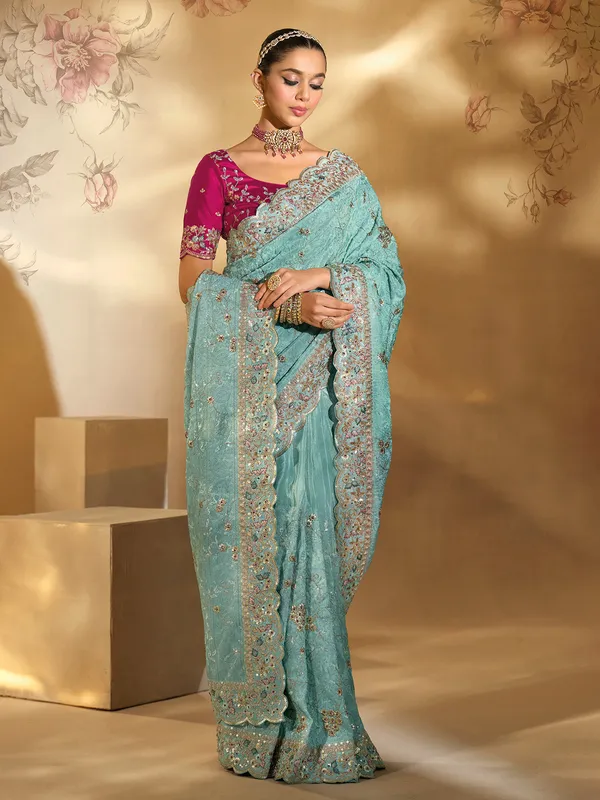 Sea green banarasi silk saree for wedding celebration