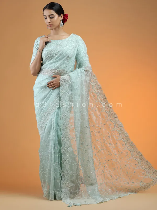 Powder blue extravagant wedding look saree in organza