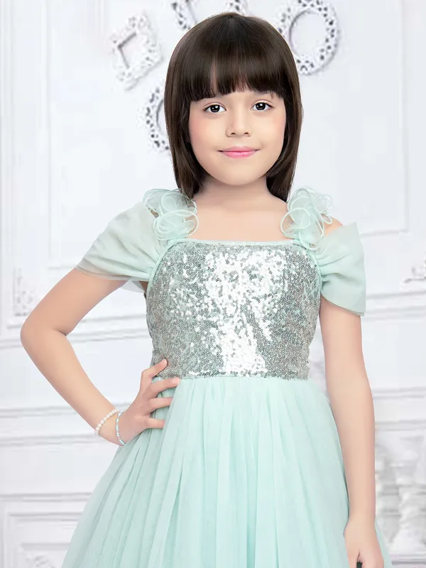 Sea green gown in net for party and reception wear
