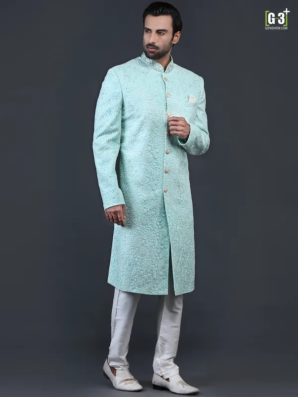 Sea green net fabric sherwani for wedding occasions