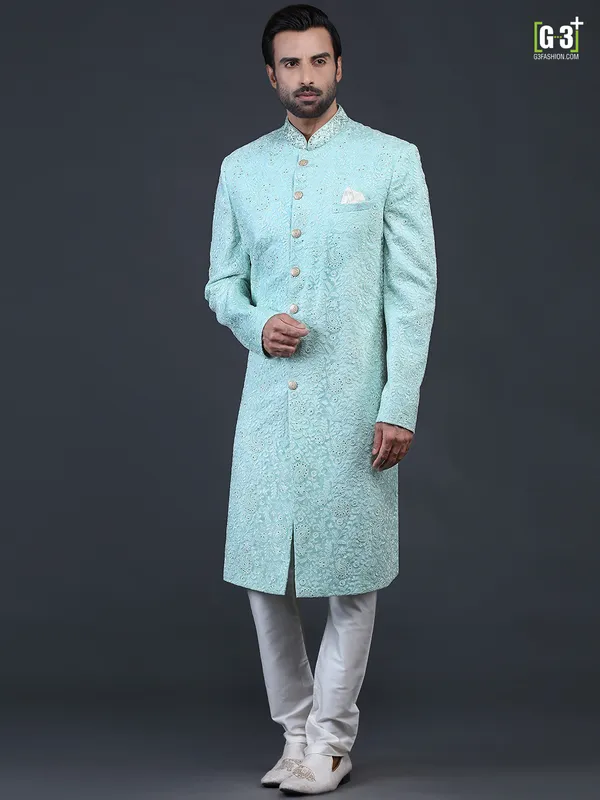 Sea green net fabric sherwani for wedding occasions