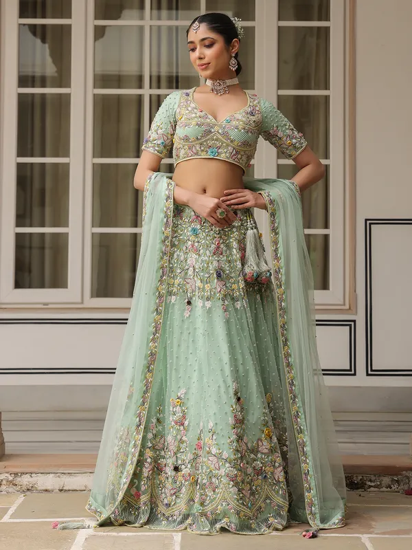 Sea green net lehenga choli for weddong wear