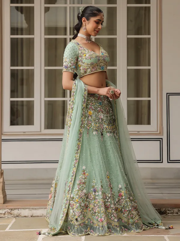 Sea green net lehenga choli for weddong wear