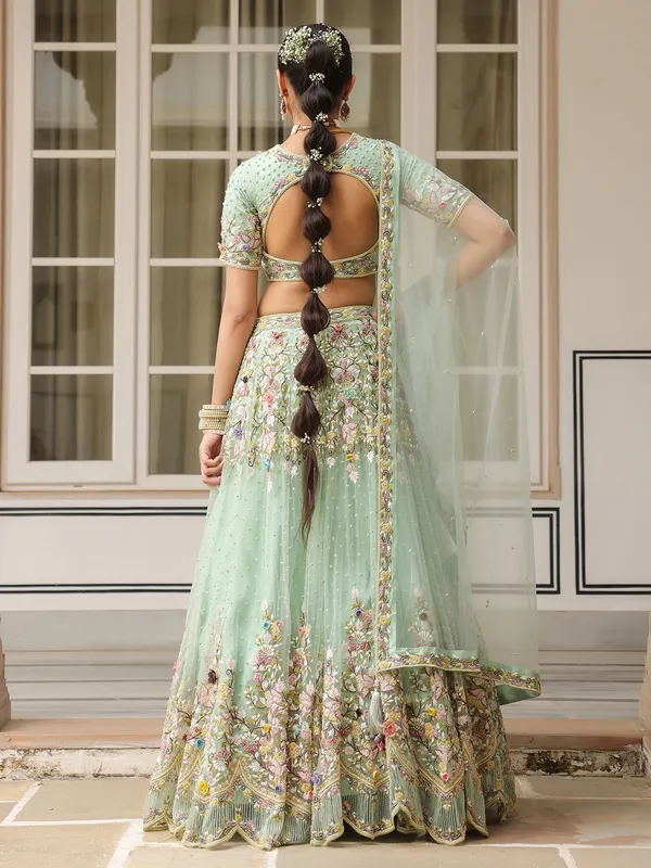 Sea green net lehenga choli for weddong wear