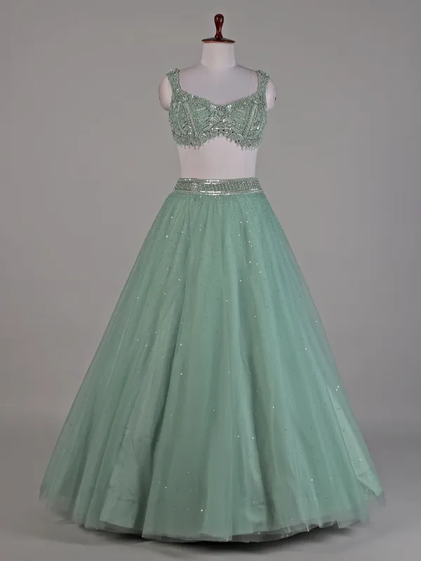 Sea green net lehenga choli for women