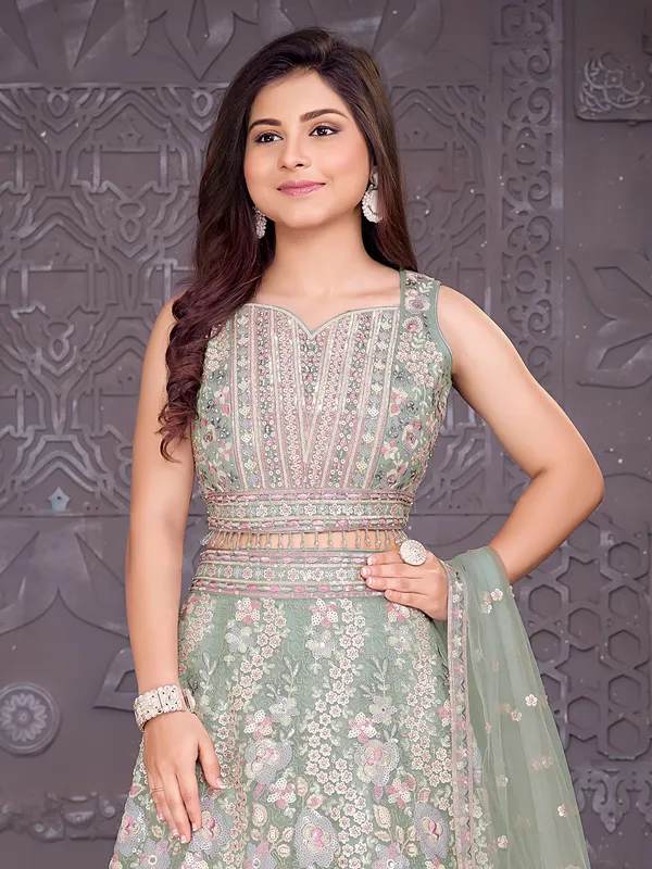 Sea green net lehenga choli with mirror work