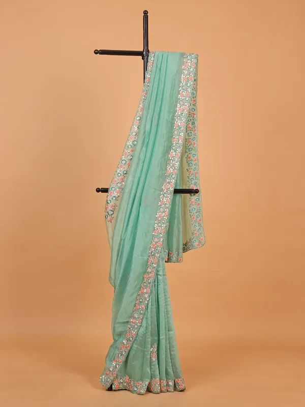 Sea green plain tissue silk saree for festivals