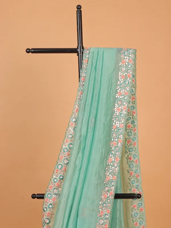 Sea green plain tissue silk saree for festivals