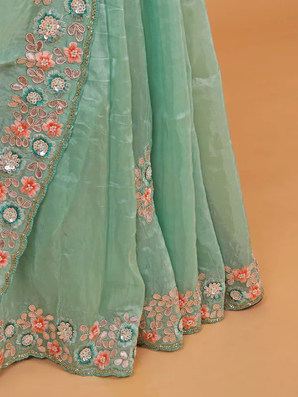 Sea green plain tissue silk saree for festivals