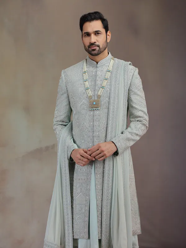 Sea green silk groom sherwani with dupatta